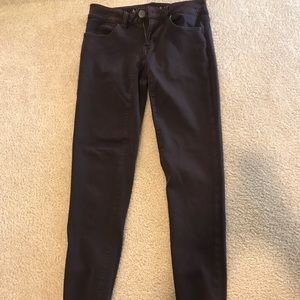 American Eagle plum colored skinny jeans